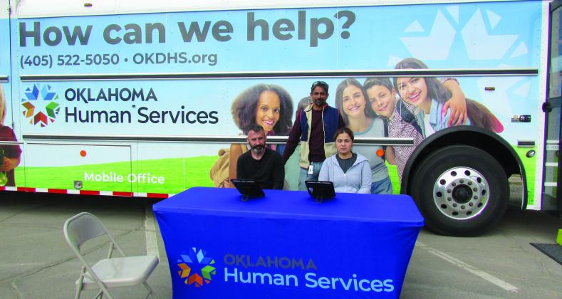 Family Services Specialists Howard Smith, Naveen Nair, and Yesenia Ramirez wait for clients in the parking lot of the Cushing Senior Citizen Center last Wednesday on April 24. The group will be offering OKDHS assistance to local clients the fourth Wednesday of every month from 9 a.m. to 4 p.m. Photo by DeAnna Maddox