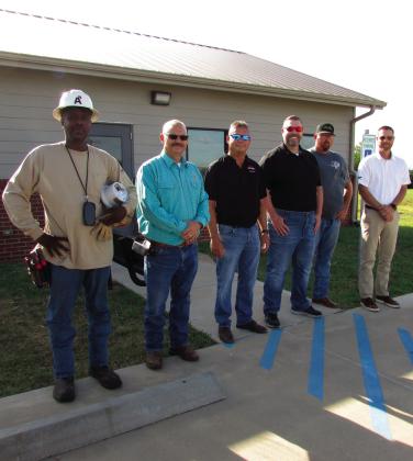 The AMI team stands together as they prepare for the first installation at the Cushing Animal Shelter. Pictured are Allegiant Utility Services install tech Quan Pugh, City of Cushing Electrical Superintendent Mike Stark, TESCO-Nighthawk Regional Manager Kevin Farrell, TESCO-Nighthawk member Jon Scott, TESCO-Nighthawk Senior Field Tech Billy Hennig, and Assistant City Manager Derek Griffith. Installs will be happening throughout the City over the next several weeks. Photo by DeAnna Maddox